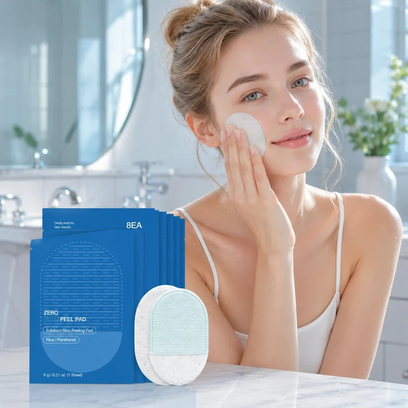 Dual-sided exfoliating pad with an eight-pack of blue sachets