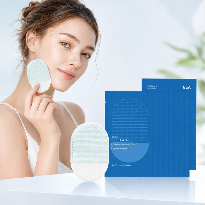 Product pack and exfoliating pads on a clean surface
